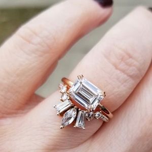 Custom designed moissanite engagement ring & band.